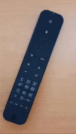 Télécommande orange qui clignote lentement puis rapidement pendant 6 secondes
